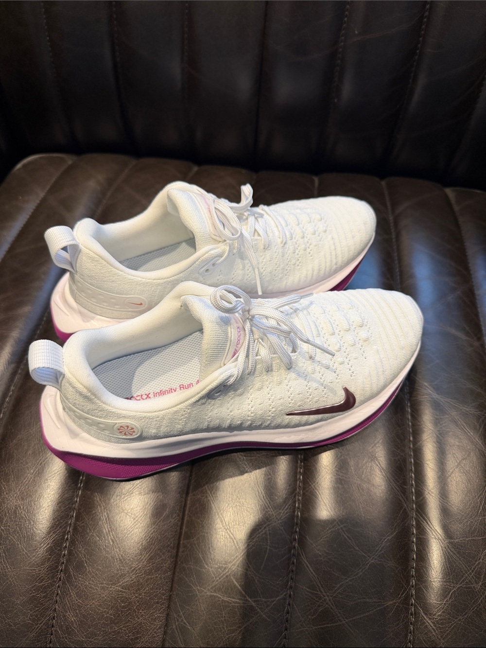 Nike Women’s White Running Shoes with Purple Accents